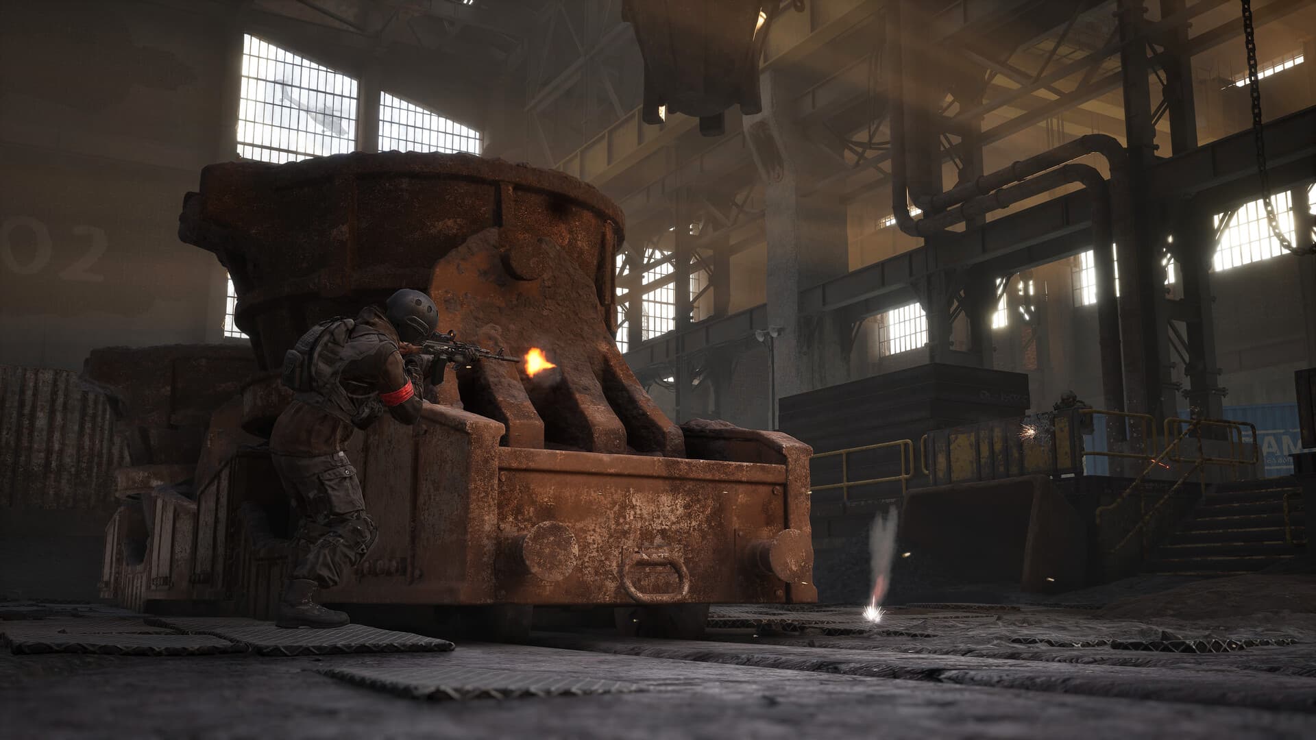 WARDOGS tank positioned inside an industrial hangar